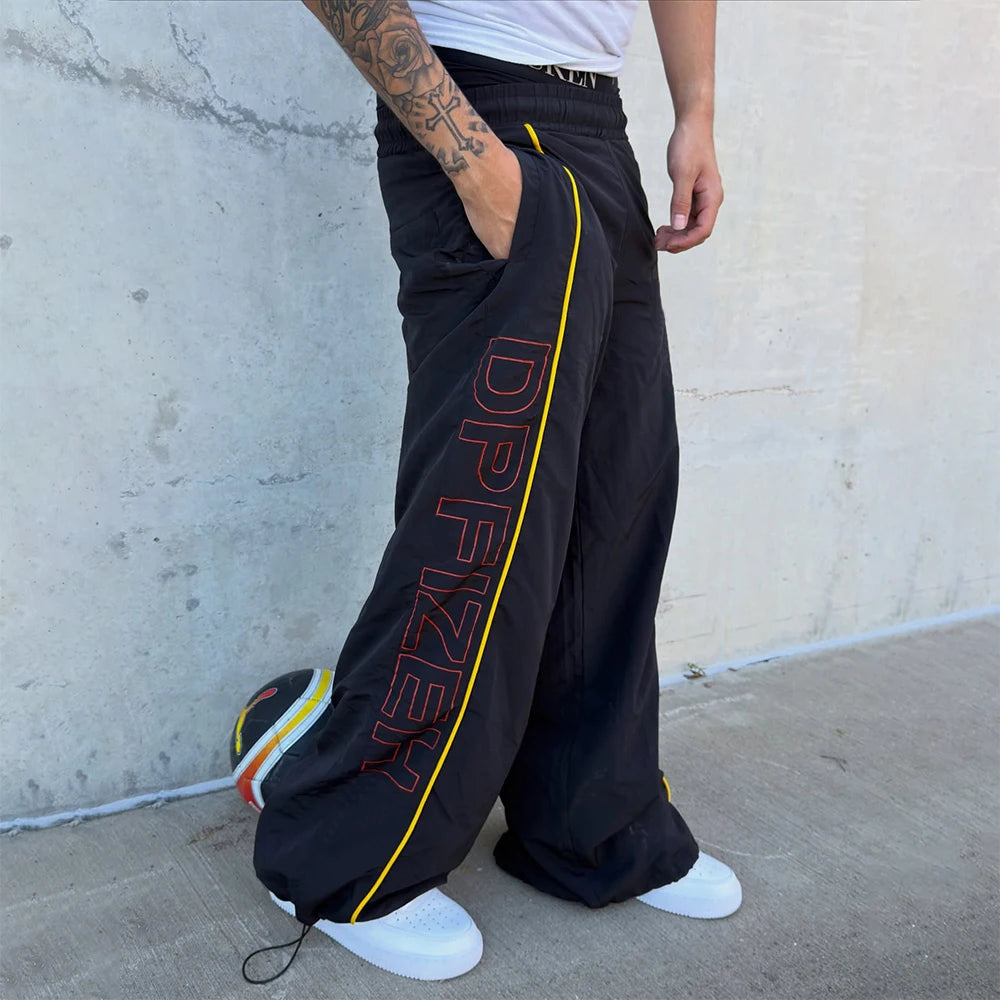 Custom Men's Baggy Stacked Windbreaker Pants Sweatpants for Men Nylon Spandex Track Pants Manufacturer
